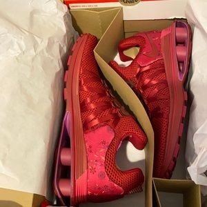 Maroon/red Nike women’s shoes size 10